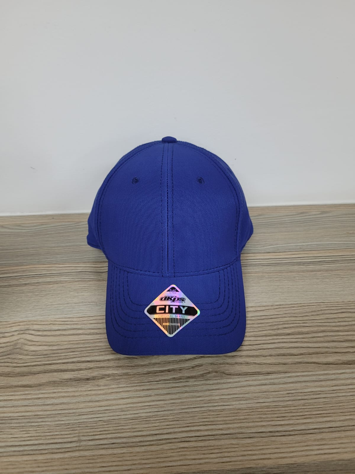 DKPS #245 GORRA CITY , POL 94% SPAN 6%, AJUSTE METALICO Y OJILLO METALICO
